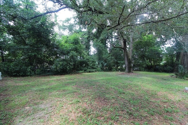 Building Photo - 2BR Cottage Home with LVP Flooring Throughout, Bonus Sunroom, Covered Parking & Low-Maintenance L...