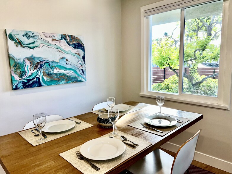 Beautiful leafy views from the West Elm dining table. - 2824 S Orange Dr