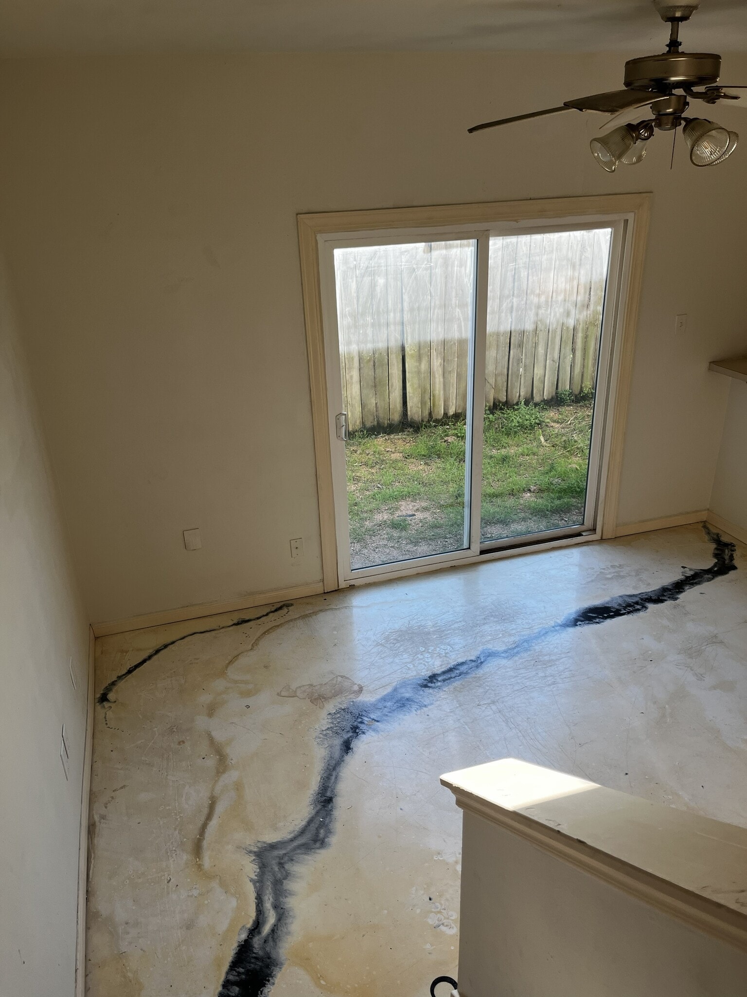 living with sliding patio door - 11807 Chetman Dr