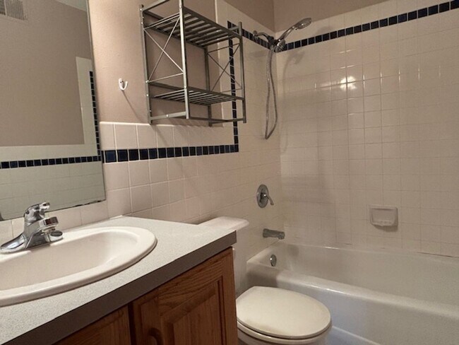 Building Photo - Spacious 4 BR/4 BA Single-Family Home in a...