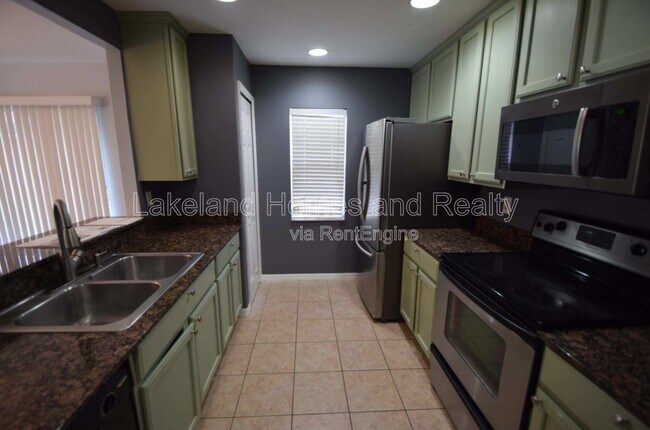 Building Photo - 5456 River Rock Rd