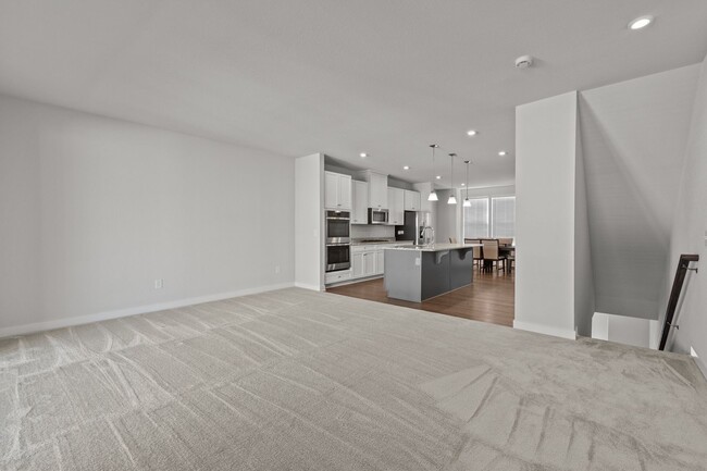 Building Photo - Welcome to this spacious and modern 4-bedr...