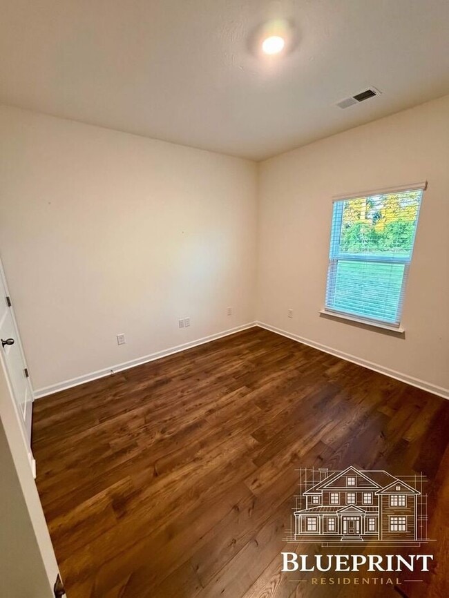 Building Photo - Single story living 2025 build with custom layout and many upgrades! Private backyard! Available ...