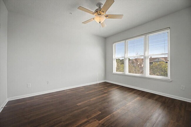 Building Photo - Peaceful Pond Views + Open Layout | 2BR + Office in Prime Location