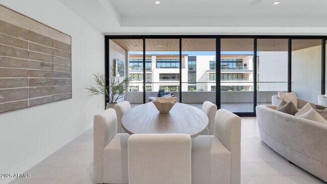 Building Photo - 6587 N Palmeraie Blvd