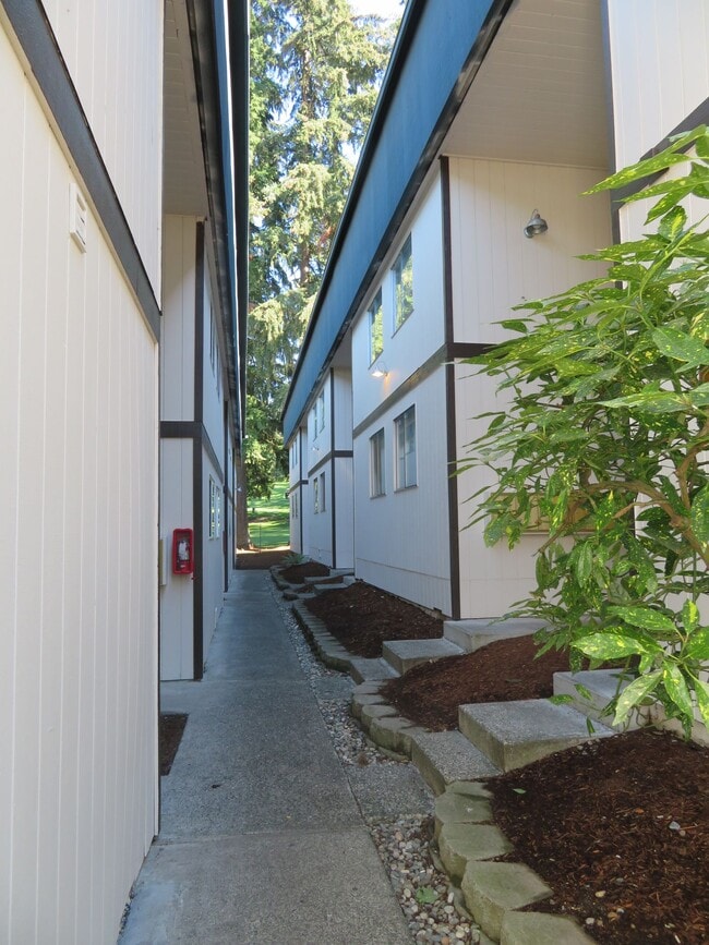 Building Photo - **Welcome to The Magenta Apartments – Luxu...