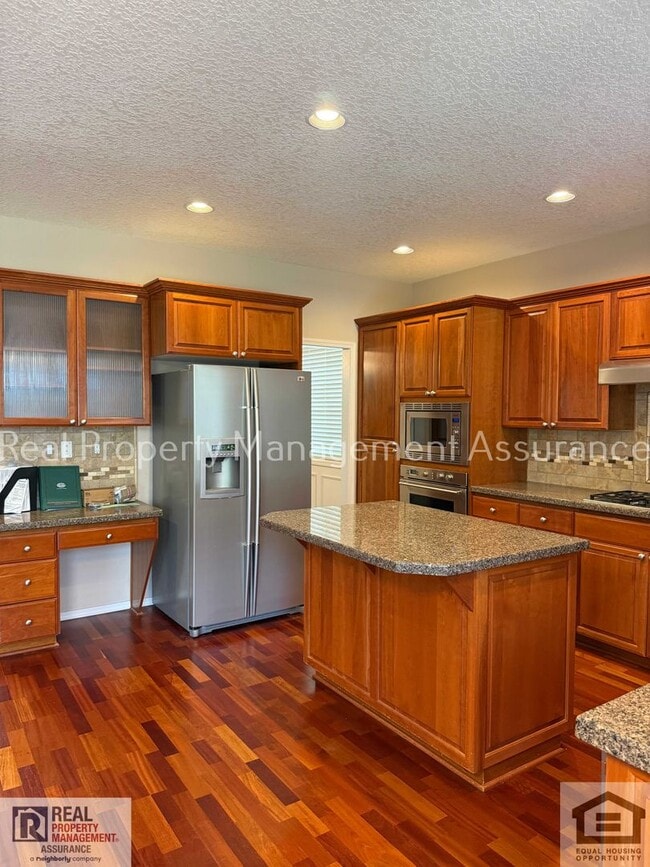 Building Photo - 13611 NW Stonebridge Dr