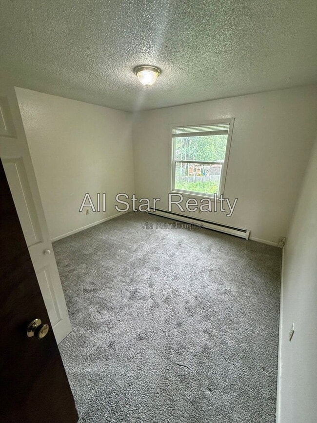 Building Photo - 5701 E 98th Ave
