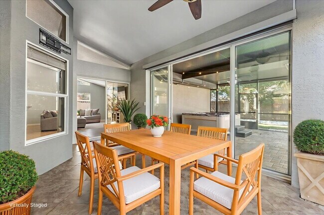Building Photo - A vibrant 2-bedroom, 2-bathroom tropical retreat designed for both high-energy entertaining and l...