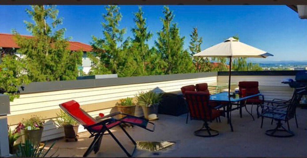 Larger of two patios with views of Rainier - 15340 Macadam Rd S