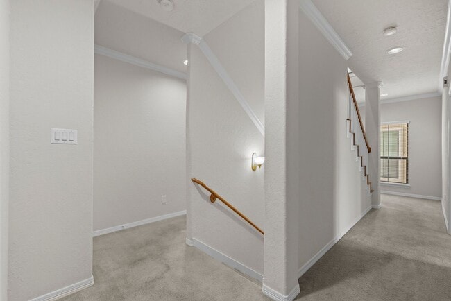 Building Photo - Stylish 3-Story Townhome with Covered Outd...