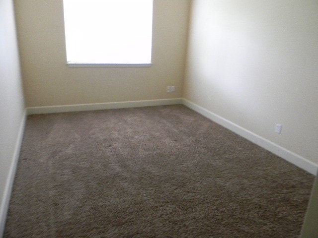 Building Photo - SPURWING LOOP CONDO (PR#2)