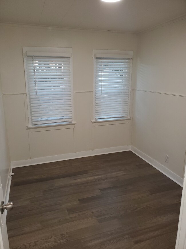 Second Bedroom with New Windows and Wood Flooring - 9343 Lomita Dr