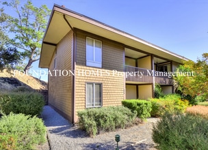 Building Photo - Bright & Tranquil End Unit!  A/C! Parking! Community Pool! FOUNDATION