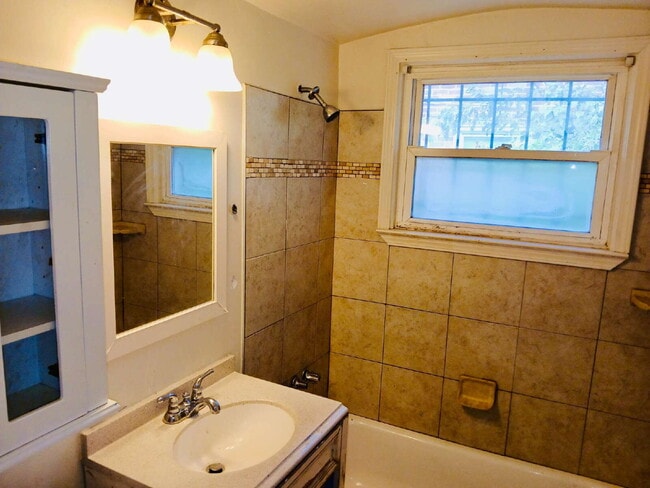 Building Photo - Charming 3-Bed, 2-Bath Gem on Woodbine Street – Cozy Comfort in 850 Sq Ft!