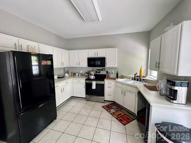 Building Photo - 8049 Stoneham Ct