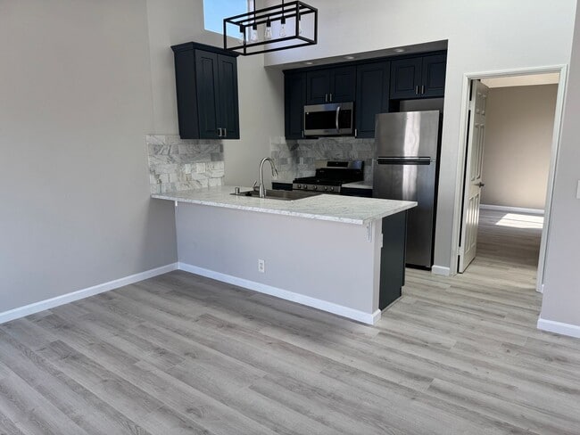 Building Photo - Eastside Costa Mesa Townhome with 2-Car Ga...