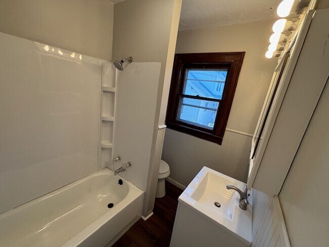 Building Photo - Classic 1928 Goodyear Heights charmer—fireplace, yard & off-street parking