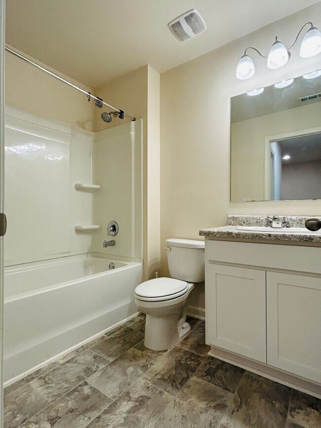 Building Photo - Wow 3 bedroom 2.5 bathroom townhome minute...