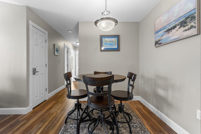 Building Photo - Welcome to Coastal Living at Harbor Landing Condominiums!