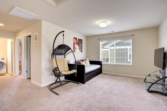 Building Photo - Bright, Spacious & Full of Charm Inside an...