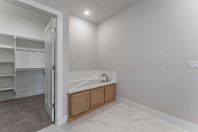 Building Photo - Modern Elegance: Spacious 4-Bedroom New Build with Private Back Porch