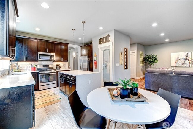 Building Photo - Luxury NW Living: 4 Bedroom Masterpiece with Dual Suites and Private Yard in Desirable Browns Point!