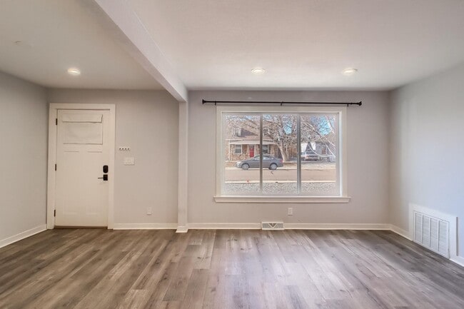 Building Photo - Modern Elegance in Denver: Recently Renovated 2BR/1BA Gem with Detached Garage and Fenced Yard!