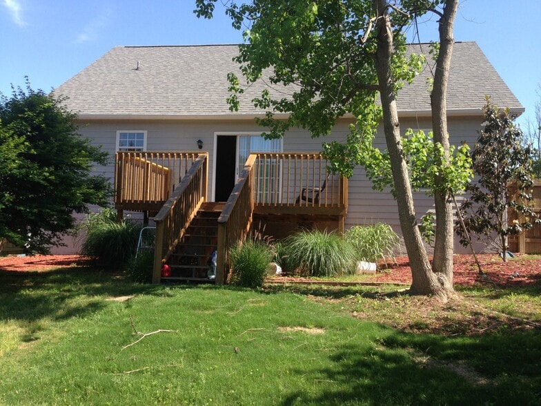 Back deck and yard. - 983 Birch Ct