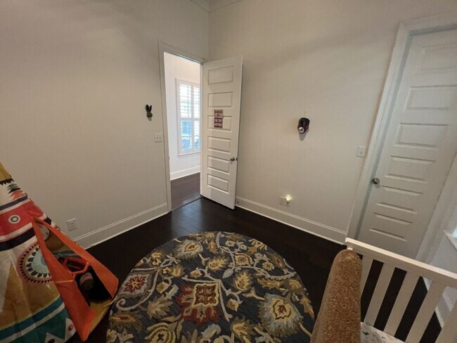 Building Photo - Luxury 4BR Home in Americana | 11 Ft Ceilings, Courtyard Living & Furnished Option