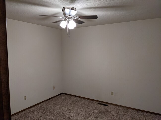 Bedroom 3 with new light/fan fixture - 1618 Julie Plz