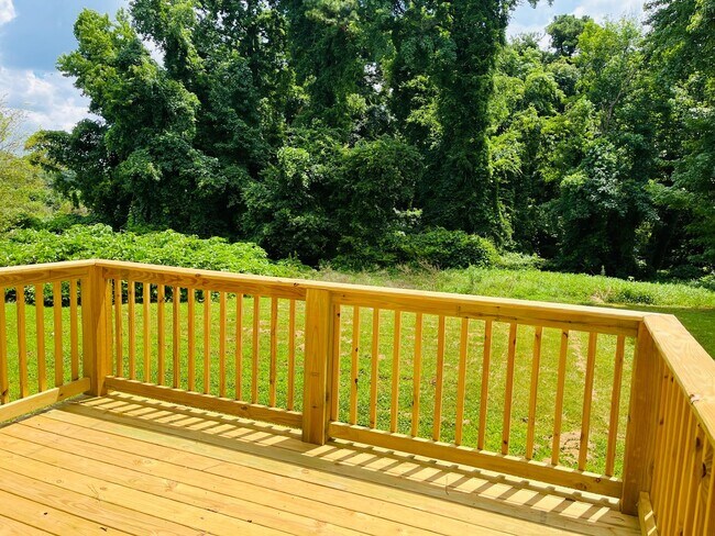 Building Photo - Wow! Check out this charming 4-bedroom, 1-...