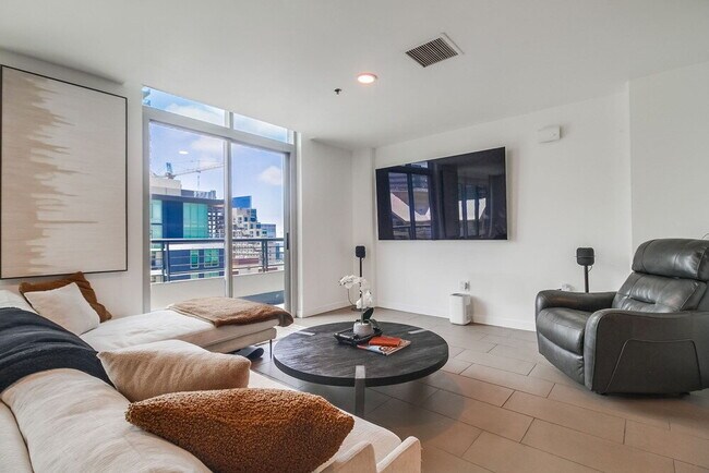 Building Photo - Penthouse Living in Charming Little Italy