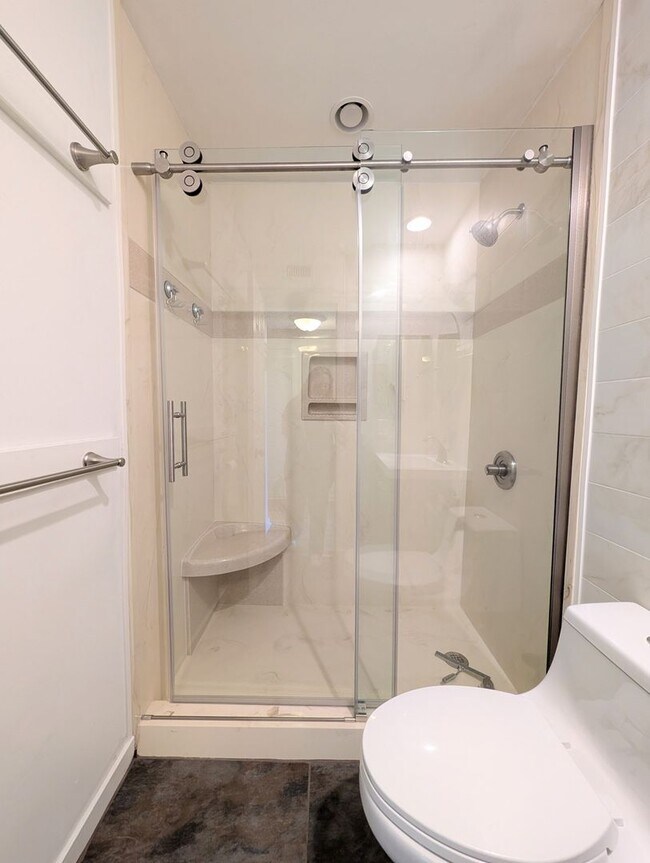 Building Photo - Dreamy Little River Condo — Furnished, Elevator Access, Pool & Marina Nearby!
