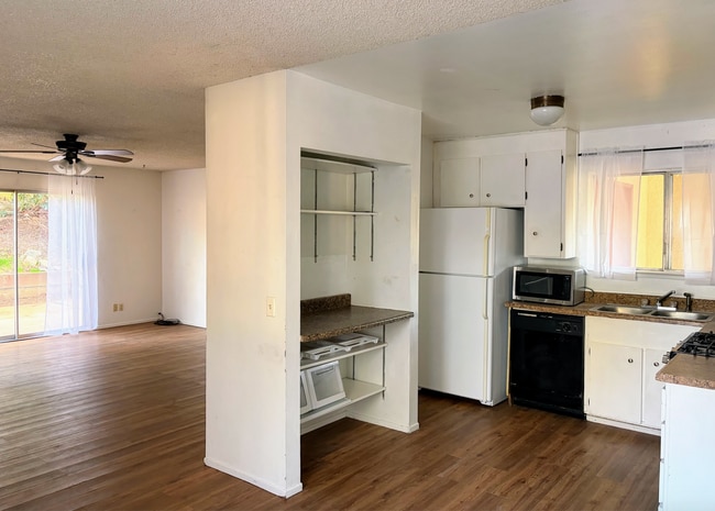 From dining area and kitchen into livingroom - 170 Westelle Dr