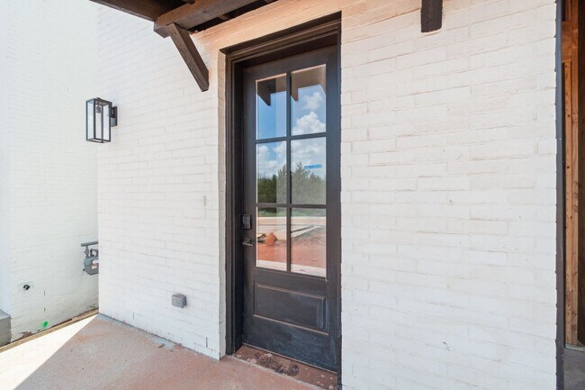 Building Photo - Bright. Clean. Calm. Your Elevated One-Bed...