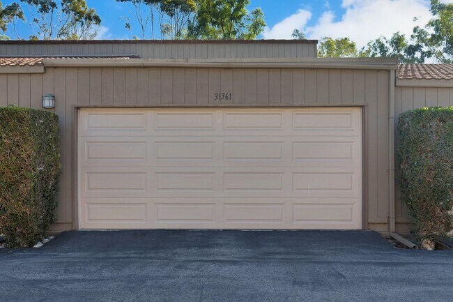 Building Photo - Lake and Golf Course View- Remodeled Condo w/ 2 Car Garage!