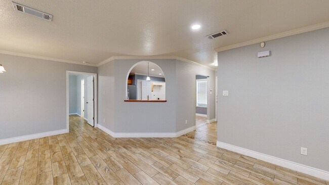 Building Photo - Completely repainted 4 bedroom ALL TILE ho...