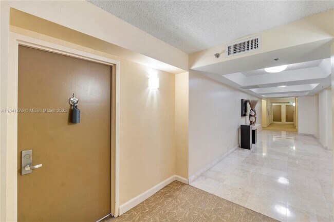 Building Photo - 6767 Collins Ave