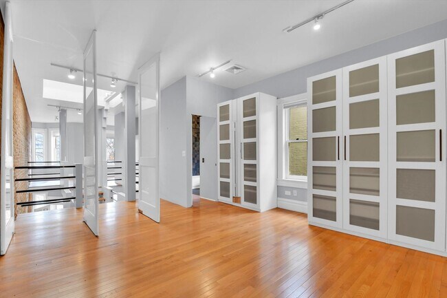 Building Photo - Architecturally Stunning Curtis Park Townhome With Historic Charm