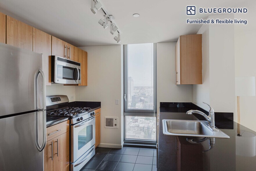 Building Photo - 4-75-75 48th Ave