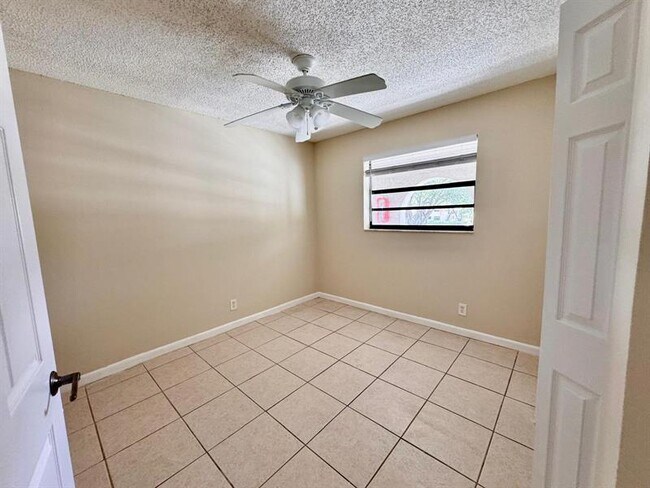 Building Photo - 11211 Royal Palm Blvd
