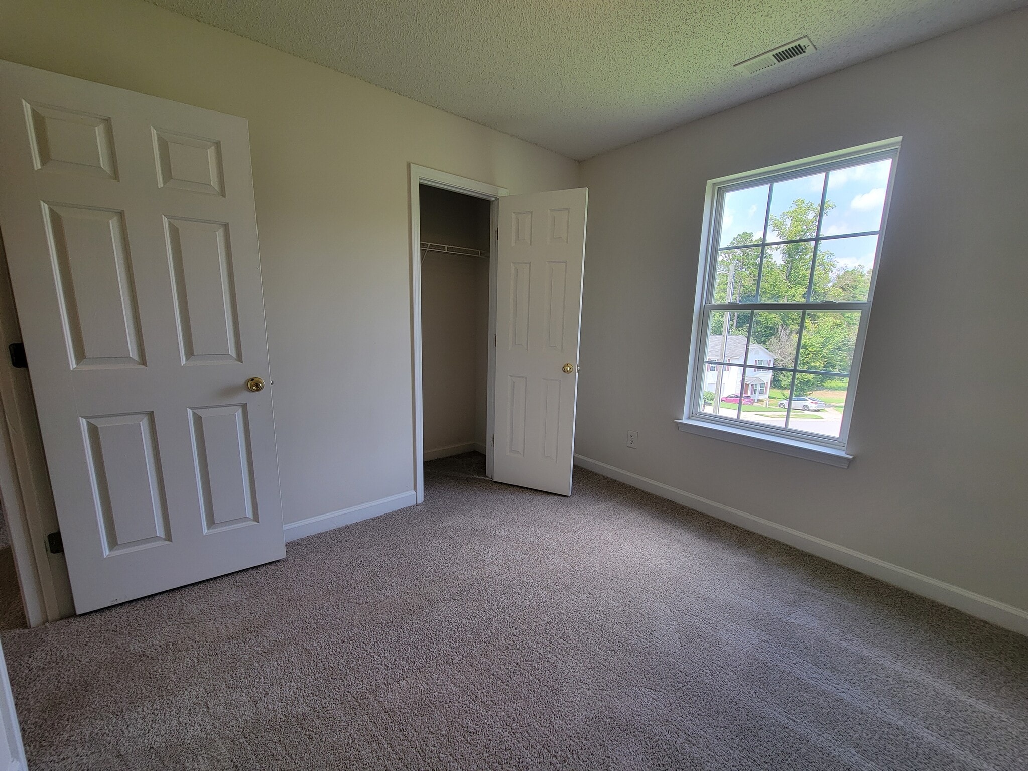 Bedroom #2 is bright and large - perfect for guests, an office or children. - 6903 Seney Dr