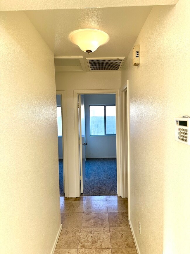 Building Photo - Adorable single story, corner lot home with 3 bedrooms, 2 bathroom and 2 car garage with a huge b...