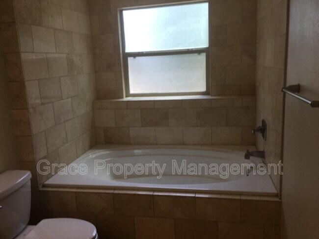 Building Photo - 9908 W 70th Pl