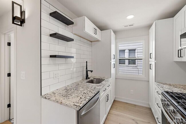 Building Photo - 308-310 East Harry Ave