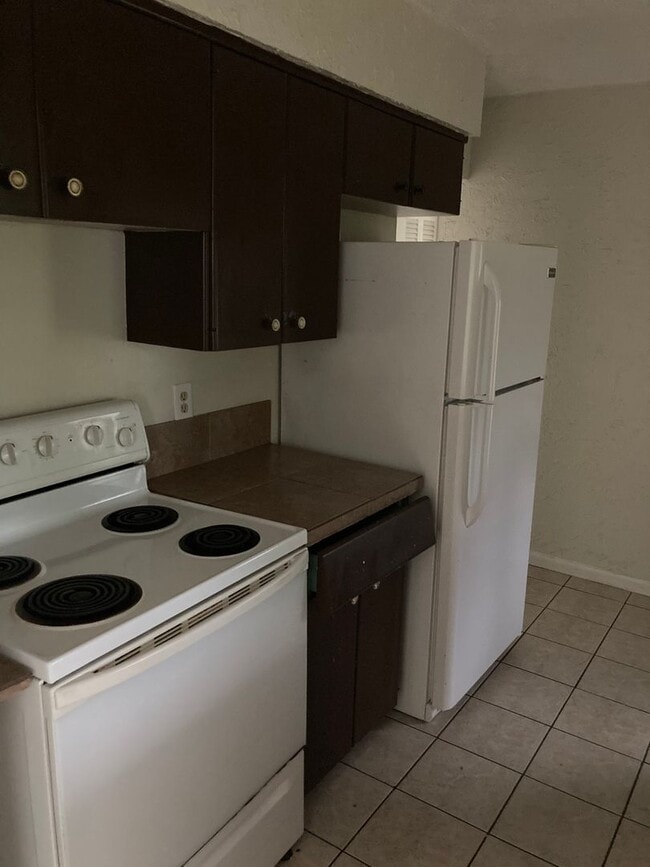 Building Photo - 2 Bed 2 Bath Home | Carport | Fenced Yard ...