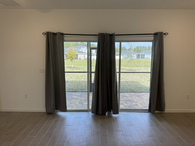 Building Photo - "Spacious 4-Bed Oasis with Granite Finishes & Guest Suite in Jacksonville!"