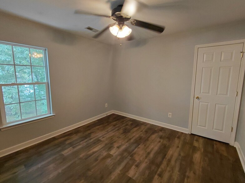 Bedroom 2 with new paint and flooring - 5043 Wheat Dr SW