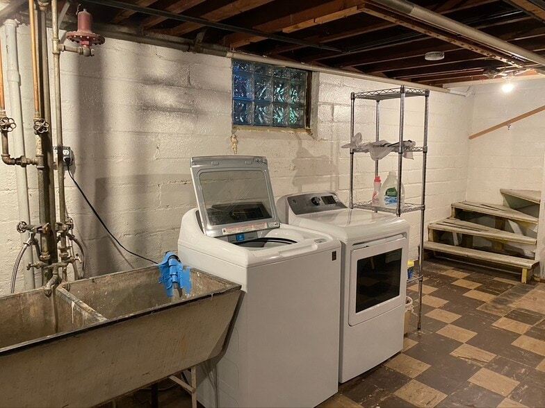 two washers and two dryers in basement - 2112 Hartford Ave